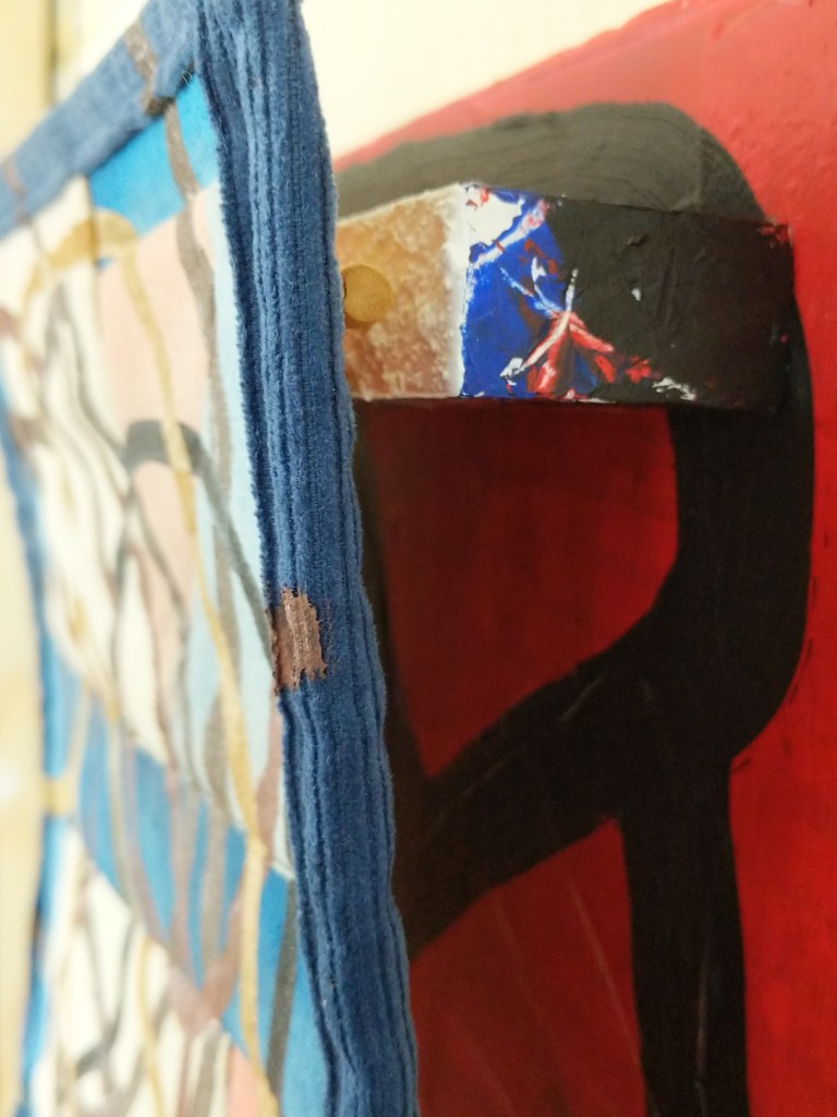 (Detail) "You Are Fully Equipped To Do This Right Now, In This Moment," Frank Korb, Acrylic, Collage (Proposed WI GOP Voter Suppression Bills, Voting Amendments to the US Constitution), Quilted Canvas, Sewn Bible Pages, Gold Leaf on Panel, 10" x 10" x 3 3/4", 2021.